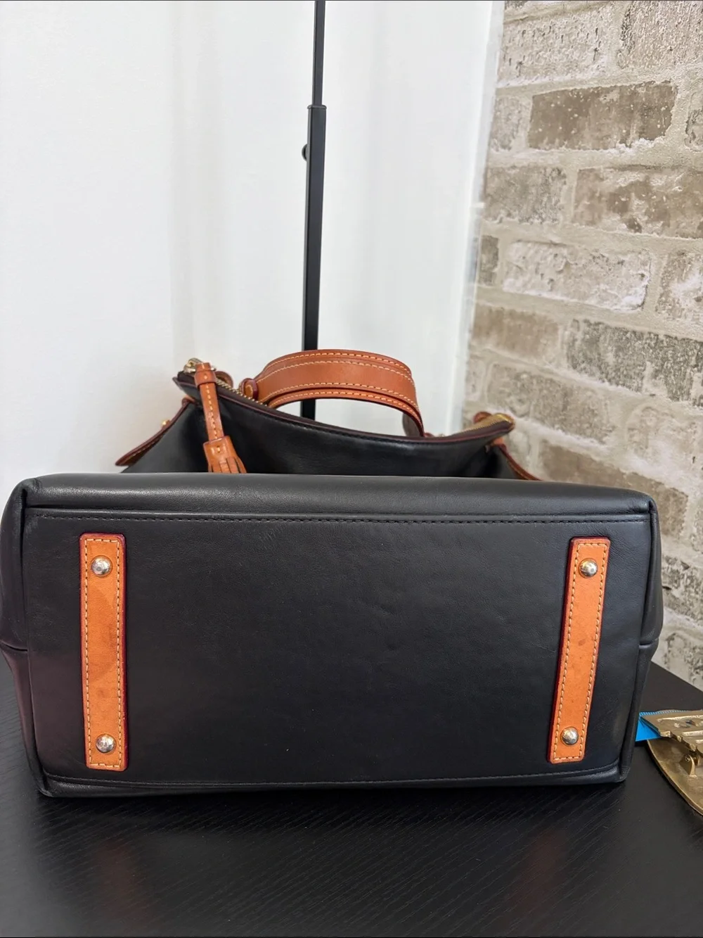 Dooney & Bourke needs screw